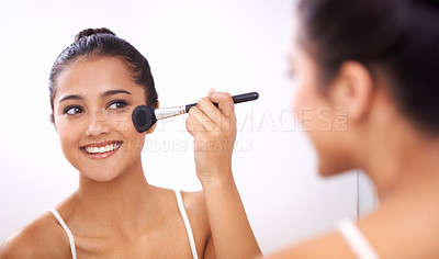 Buy stock photo Happy woman, makeup brush and face in mirror for cosmetics, grooming or beauty in bathroom at home. Female person smile and applying foundation, blush or contour for facial treatment in reflection