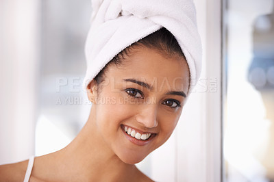 Buy stock photo Woman, portrait and happy for skincare in bathroom, smiling and pride for beauty or facial treatment. Indian female person, dermatology and luxury cosmetics for wellness, healthy and glowing skin