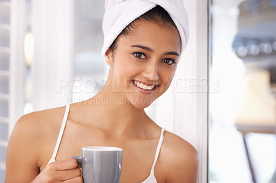 Buy stock photo Woman, coffee and portrait in a home with a towel in the morning from hot drink and cup. Lounge, happy and relax Indian female person with espresso or tea in a house ready to start the day with a mug
