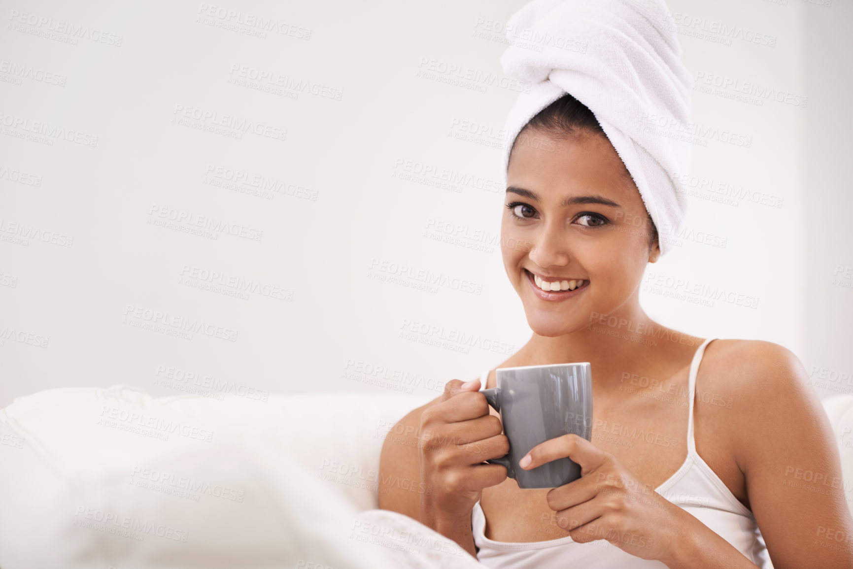 Buy stock photo Woman, coffee and portrait in a home with mockup space in the morning from hot drink and smile. Lounge, happy and relax Indian female person with espresso or tea in a house ready to start the day