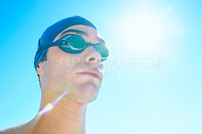Buy stock photo Swimmer, sky and face of sports man determined for exercise, outdoor workout or training routine. Swimwear, sunshine or athlete with cap, goggles and commitment to summer challenge, fitness or cardio