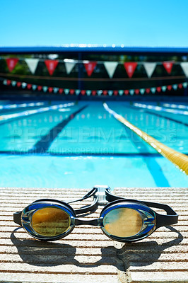Buy stock photo Closeup shot of goggles on the poolside