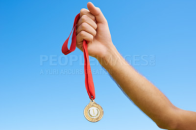 Buy stock photo Gold medal, sky and hands of sports person winning award, competition victory or game in outdoor contest. Marathon champion, triathlon winner or closeup athlete with prize, success and achievement