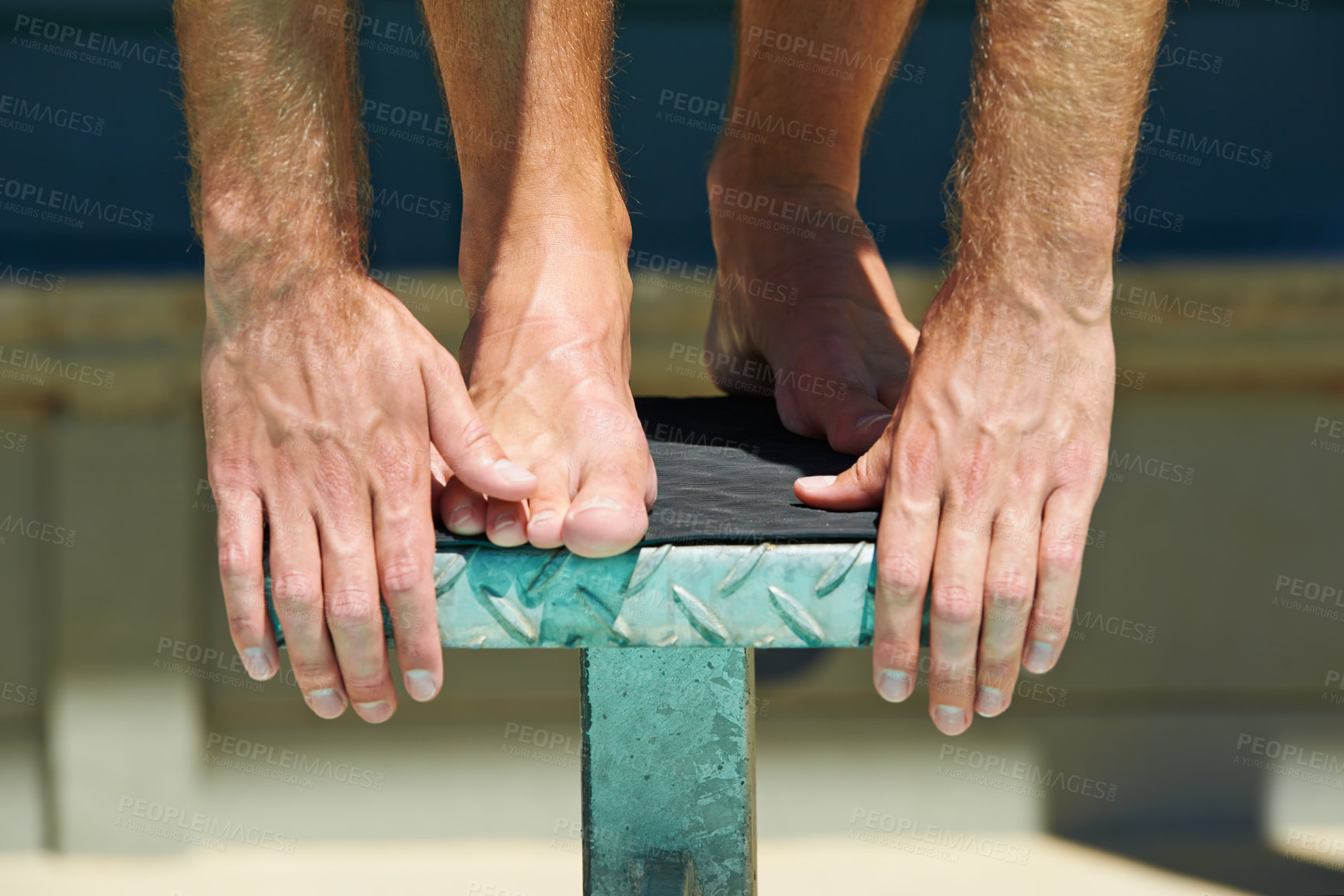 Buy stock photo Swimming, legs and sports person on podium for fitness exercise, outdoor practice or practice race. Hands, athlete commitment and swimmer start competition, cardio performance or training for contest