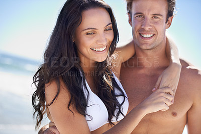 Buy stock photo Portrait, laugh and happy couple at ocean for holiday adventure together on tropical island with blue sky. Smile, man and woman on beach vacation with waves, hug and romantic travel in Indonesia.