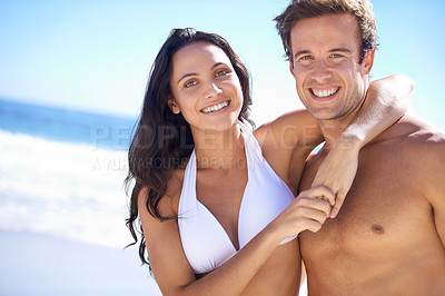 Buy stock photo Hug, portrait and happy couple at ocean for holiday adventure together on tropical island with blue sky. Smile, man and woman on beach vacation with waves, embrace and romantic travel in Bali in love