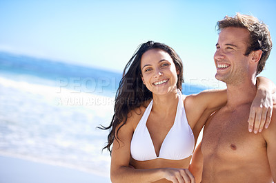Buy stock photo Portrait, love and happy woman with man on beach for holiday adventure together on tropical island with space. Smile, couple and ocean vacation with waves, hug and mockup on romantic travel in Bali