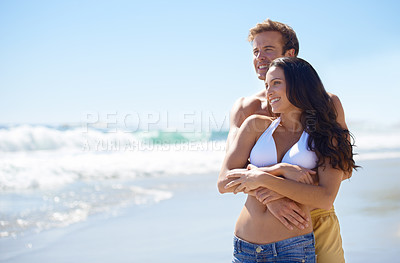 Buy stock photo Embrace, love and happy couple on beach for holiday adventure together on tropical island with blue sky. Smile, man and woman on ocean vacation with waves, hug and mockup on romantic travel in Hawaii