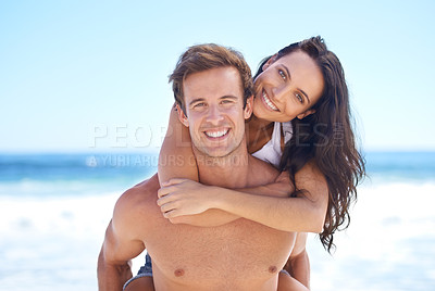 Buy stock photo Portrait, hug and happy couple on beach for holiday adventure together on tropical island with blue sky. Smile, man and woman on ocean vacation with waves, embrace and piggy back on romantic travel.
