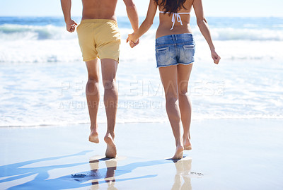 Buy stock photo Holding hands, running and couple on beach for holiday adventure together on tropical island with waves. Love, man and woman on ocean vacation with waves, romance and support on travel in Indonesia.