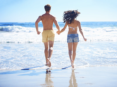 Buy stock photo Couple, holding hands and running on beach for holiday, swimming in summer and vacation by ocean. Back of people in bikini with love, valentines day and fun in sun and water or sea for anniversary