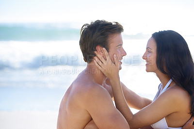 Buy stock photo Embrace, love and happy couple on beach for romantic holiday adventure together on tropical island with fun. Smile, man and woman on ocean vacation with waves, hug and mockup space on travel in Bali.