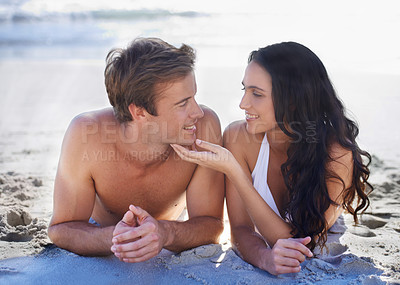 Buy stock photo Love, smile and relax with couple on beach together for summer vacation, holiday or romance on sand. Travel, island or tropical with happy young man and woman on coast by sea or ocean for bonding