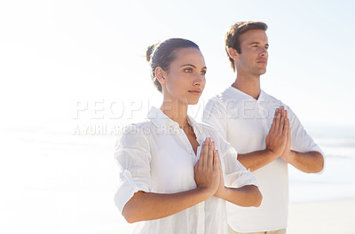 Buy stock photo Yoga, meditation and summer with couple on beach together for wellness, zen or holistic exercise. Travel, awareness or mindfulness with young man and woman by sea or ocean for balance and inner peace
