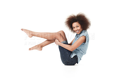 Buy stock photo African woman, happy style and portrait holding legs on studio floor with casual fashion. Isolated, white background and young female person with body confidence and modern clothes on the ground