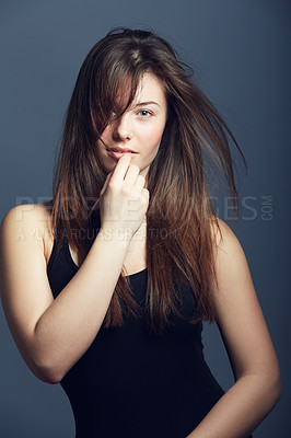 Buy stock photo Portrait, beauty and woman with hair care, volume and confident model against a dark studio background. Face, female person and girl with texture, cosmetics and hairstyle with growth and treatment