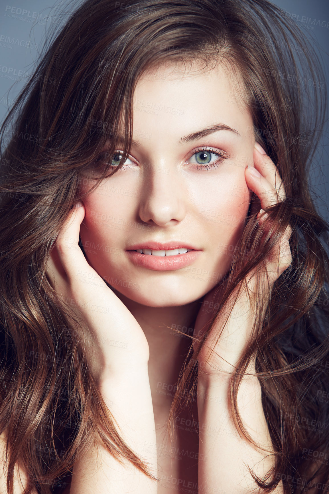 Buy stock photo Portrait of a beautiful young woman looking at the camera