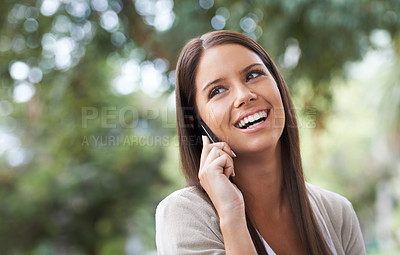 Buy stock photo Woman, phone call and communication in park for connection, conversation or gossip. Female person, digital device and smile in nature for speaking chat or exciting news, information or discussion