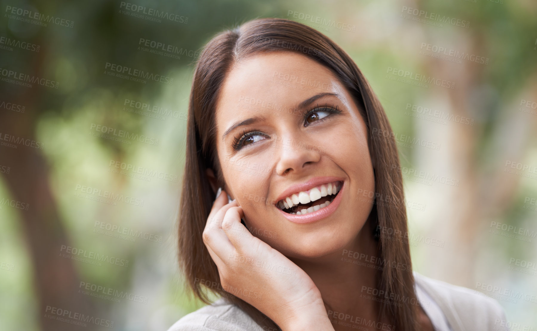 Buy stock photo Woman, phone call and conversation in park for good news, connection or gossip. Female person, digital device and smile in nature for speaking communication for advice chat, information or discussion