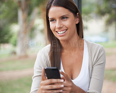 Buy stock photo Woman, cellphone and texting outdoor for online connection, internet or message. Female person, digital device and nature park for relax for chat typing or web browsing, social media or communication