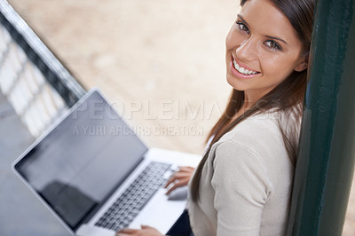 Buy stock photo College student, outdoor and portrait of woman with laptop, research and studying for education. University, person and smile with online course on computer at campus, park or working in city