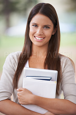 Buy stock photo Student, portrait and books with happy in park, technology and education in nature for studying. University, young woman and smile on face by outdoor, campus and learning in college with commitment