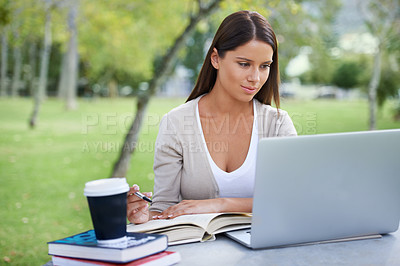 Buy stock photo Student, books and coffee with laptop in park, technology and education by table for studying. College, young woman and commitment with outdoor by tea, focus and writing notes with online connection