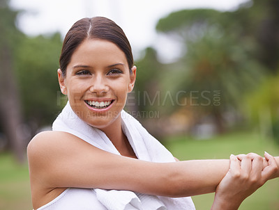 Buy stock photo Park, thinking or happy woman stretching arms in training, exercise or outdoor workout. Nature, smile or healthy girl runner with towel, ready to start activity for fitness, sports or warm up