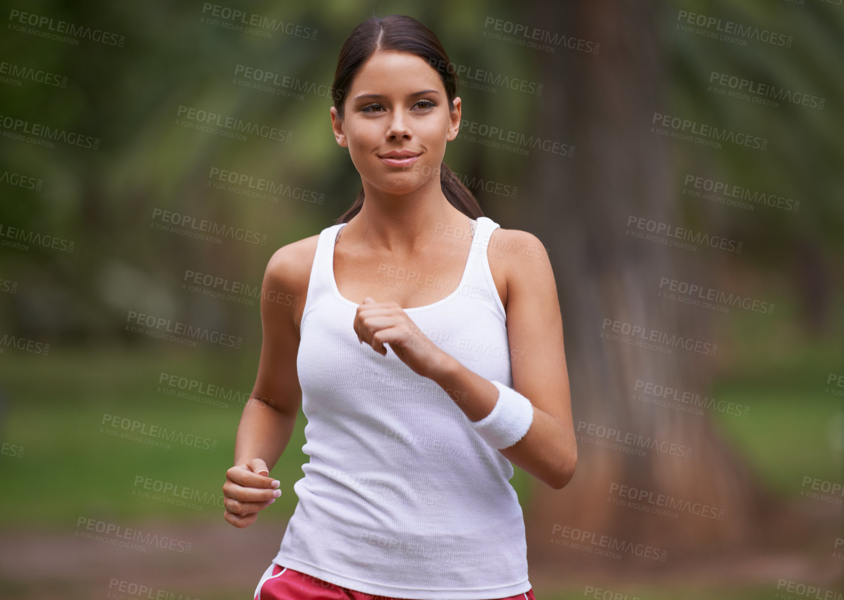 Buy stock photo Park, runner and woman running in nature training, cardio exercise and endurance workout for wellness. Sports, fitness or healthy female athlete on fast jog on outdoors in forest with speed or action