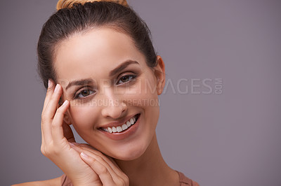 Buy stock photo Portrait, smile and beauty with woman on space in studio for skincare, wellness or natural cosmetics. Face, aesthetic and mockup with happy young person on gray background for natural dermatology
