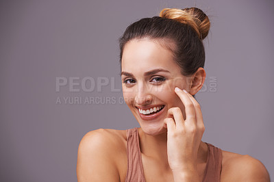Buy stock photo Portrait of happy woman, touching or beauty for cosmetics or skincare dermatology for facial glow. Results, natural face or confident model with smile, joy or wellness in studio on purple background