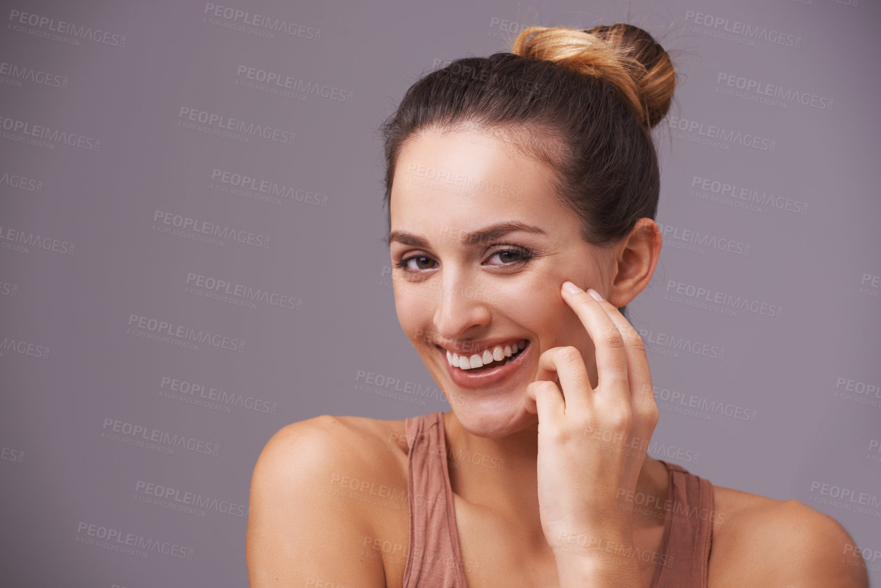 Buy stock photo Portrait of happy woman, touching or beauty for cosmetics or skincare dermatology for facial glow. Results, natural face or confident model with smile, joy or wellness in studio on purple background