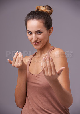 Buy stock photo Portrait of woman, come here or calling hand gesture for greeting, support or communication. Join sign, welcome or confident model with natural beauty, smile or wellness in studio on grey background
