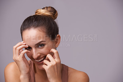 Buy stock photo Portrait, space or happy woman laughing with natural beauty in studio with funny joke with mockup. Face, skincare or female model enjoying comedy or humor on purple background with smile or wellness