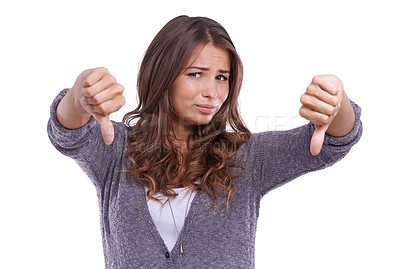 Buy stock photo Thumbs down, portrait and unhappy woman in studio with rating for rejection, emoji sign or feedback of bad news on white background. Model show negative review, wrong decision and vote no for opinion