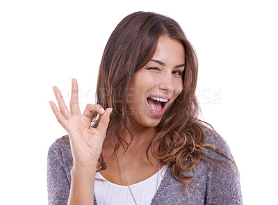 Buy stock photo Ok, wink and portrait of woman in studio for vote, certified news and feedback on white background. Happy model blink with hand emoji for success, agreement and icon of excellence, review and support