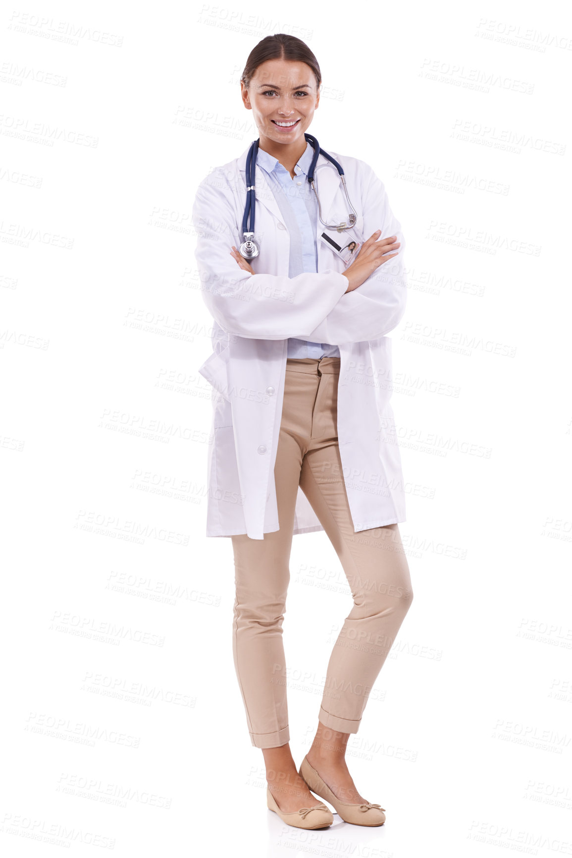 Buy stock photo Portrait of a beautiful doctor standing with arms folded against a white background