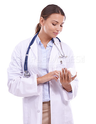 Buy stock photo Woman, doctor and reading label of medication for pills, prescription or side effect on a white studio background. Female person, pharmacist or medical nurse checking dosage for healthcare results