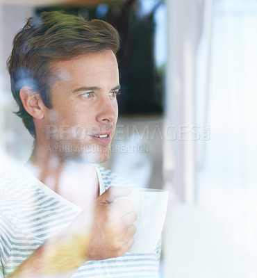 Buy stock photo Man, coffee cup and thinking by window in morning with smile, vision or idea with drink, choice or remember in home. Person, tea and happy with view for memory, decision or relax on holiday in house