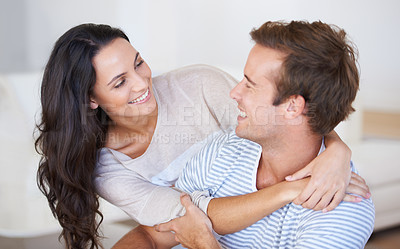 Buy stock photo Happy couple hug, relax and love with trust, marriage and healthy relationship with affection at home. People bonding, loyalty and connection with smile, partner and romance together at house