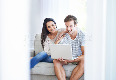 Buy stock photo Couple, laptop and watch movies on couch with love, living room and wellness in marriage for bonding. Woman, man and smile for relationship care on subscription, weekend and streaming video in home