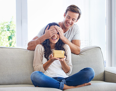 Buy stock photo Surprise, couple and cover eyes in house with present, love and playful in marriage with anniversary in home. Man, hands and woman face for gift in relationship, together and celebrate in living room