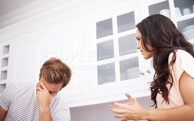 Buy stock photo Couple, home and fight, angry and conflict with crisis in life, mistake or marriage fail with anxiety and stress. Frustrated people arguing in kitchen, cheating or problem with risk of divorce