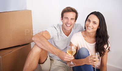 Buy stock photo Couple, portrait and wine in new house and celebration with happiness and real estate. Property, glasses with alcohol drink and people moving with boxes excited for future investment and mortgage