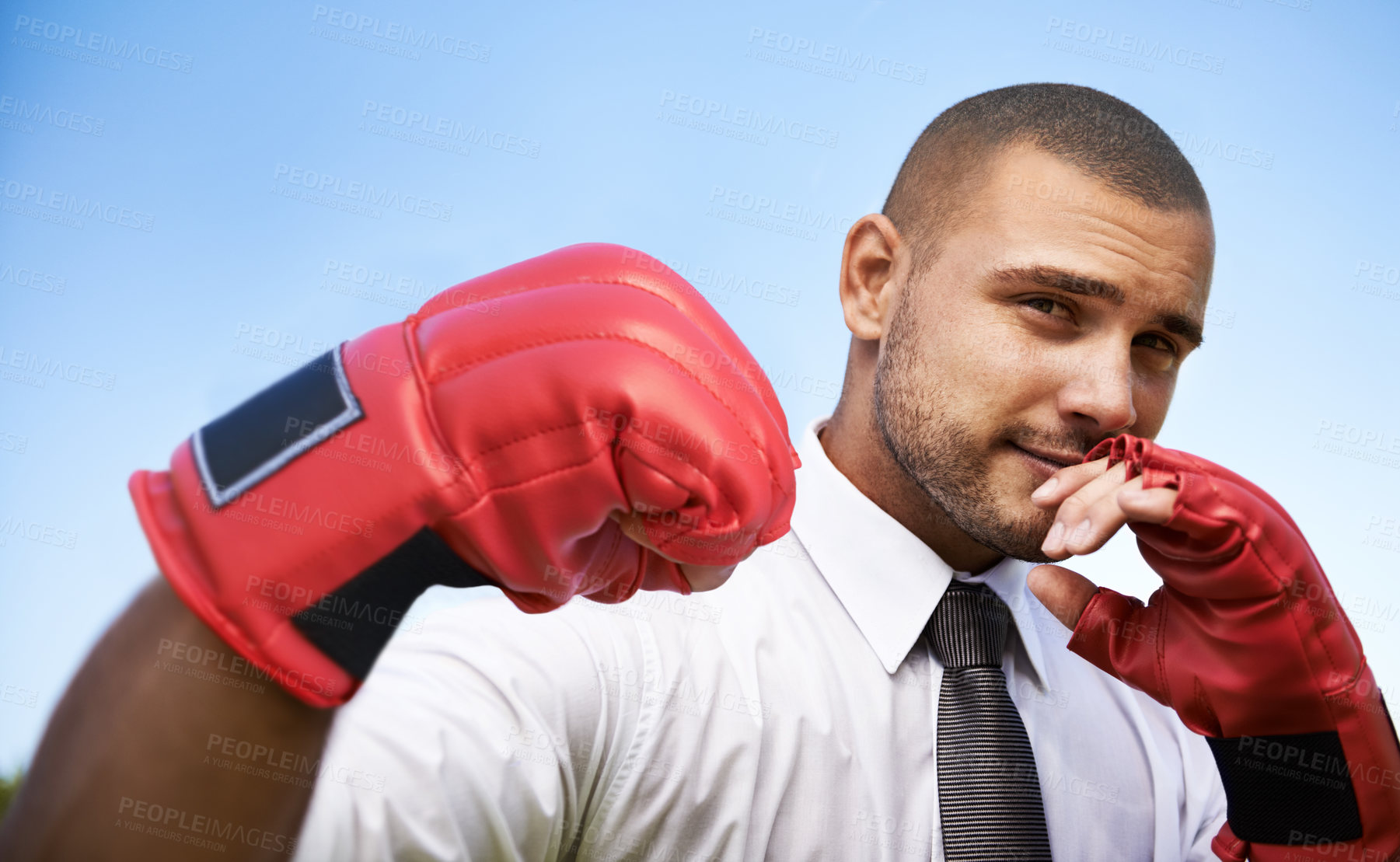 Buy stock photo Business man, portrait and boxing gloves for fight or warrior, self defence and fitness for wellness. Male person, strong and equipment for power or corporate challenge, exercise and sky background