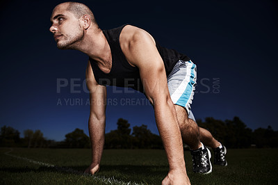 Buy stock photo Man, runner and start line for exercise training or night for competition endurance, fitness or performance. Male person, sports and workout outdoor in dark for morning commitment, track or practice