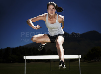 Buy stock photo Woman, portrait and hurdle jumping training for fitness sport practice, endurance or performance. Female person, face and leap outdoor at dark night for athletics health or exercise, race or workout