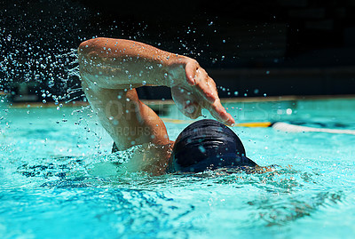Buy stock photo Pool, water splash and athlete swimming in sport for competition, race or training in cardio. Fitness, workout and person exercise for health, wellness or practice stroke or performance in gym