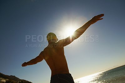 Buy stock photo Beach, sky and sports man for swimming exercise, nature workout or outdoor practice in water, sea or island. Freedom, sunset and back of athlete for challenge, fitness or cardio with Hawaii fresh air