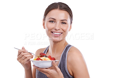 Buy stock photo Studio, model and fruit in portrait for breakfast, morning and nutrition with vitamins for wellness. Young woman, happiness or face in mockup for organic strawberry, bowl or fibre by white background